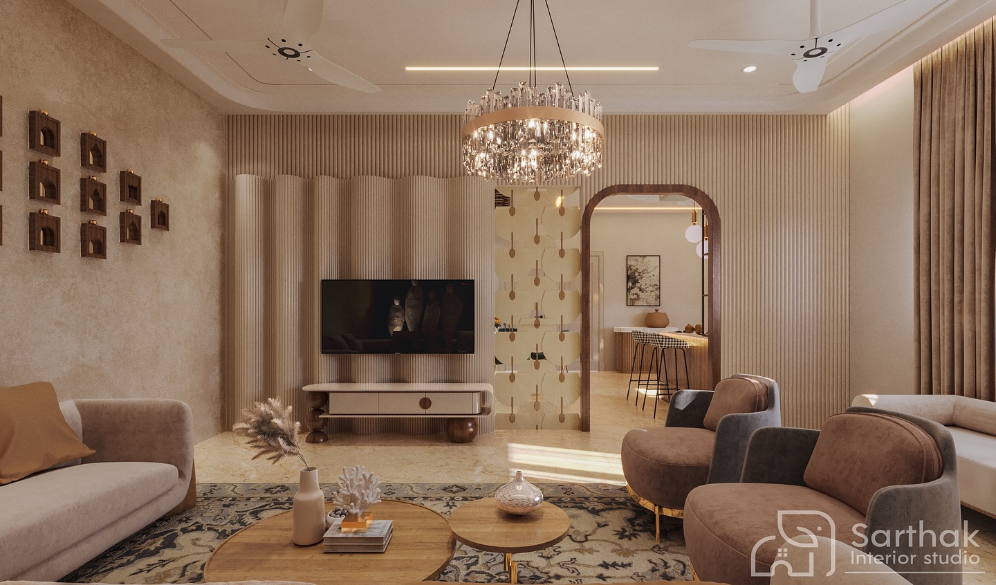 Living room with a curved gold-trimmed chandelier, fluted wall panels and a warm neutral palette